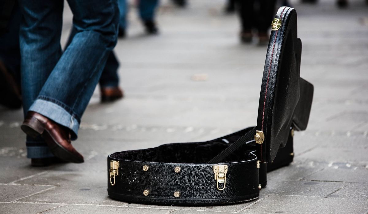 Open black guitar case