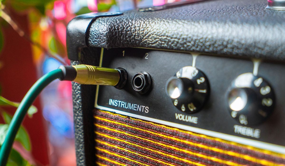 Instrument cable plugged into an amplifier input