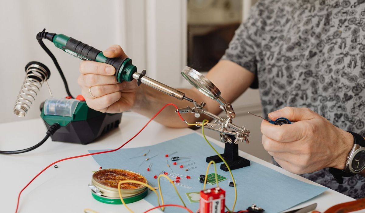 Soldering iron and circuit work on a bench